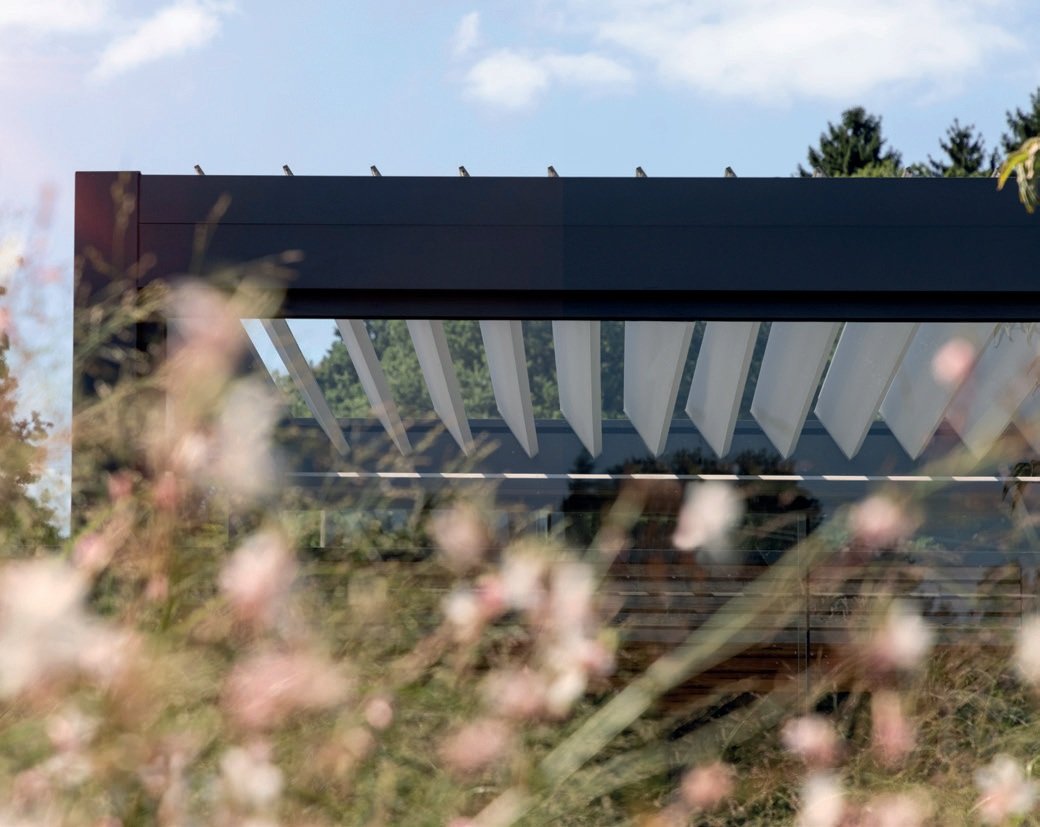 Lamellendach als freistehender Kubus