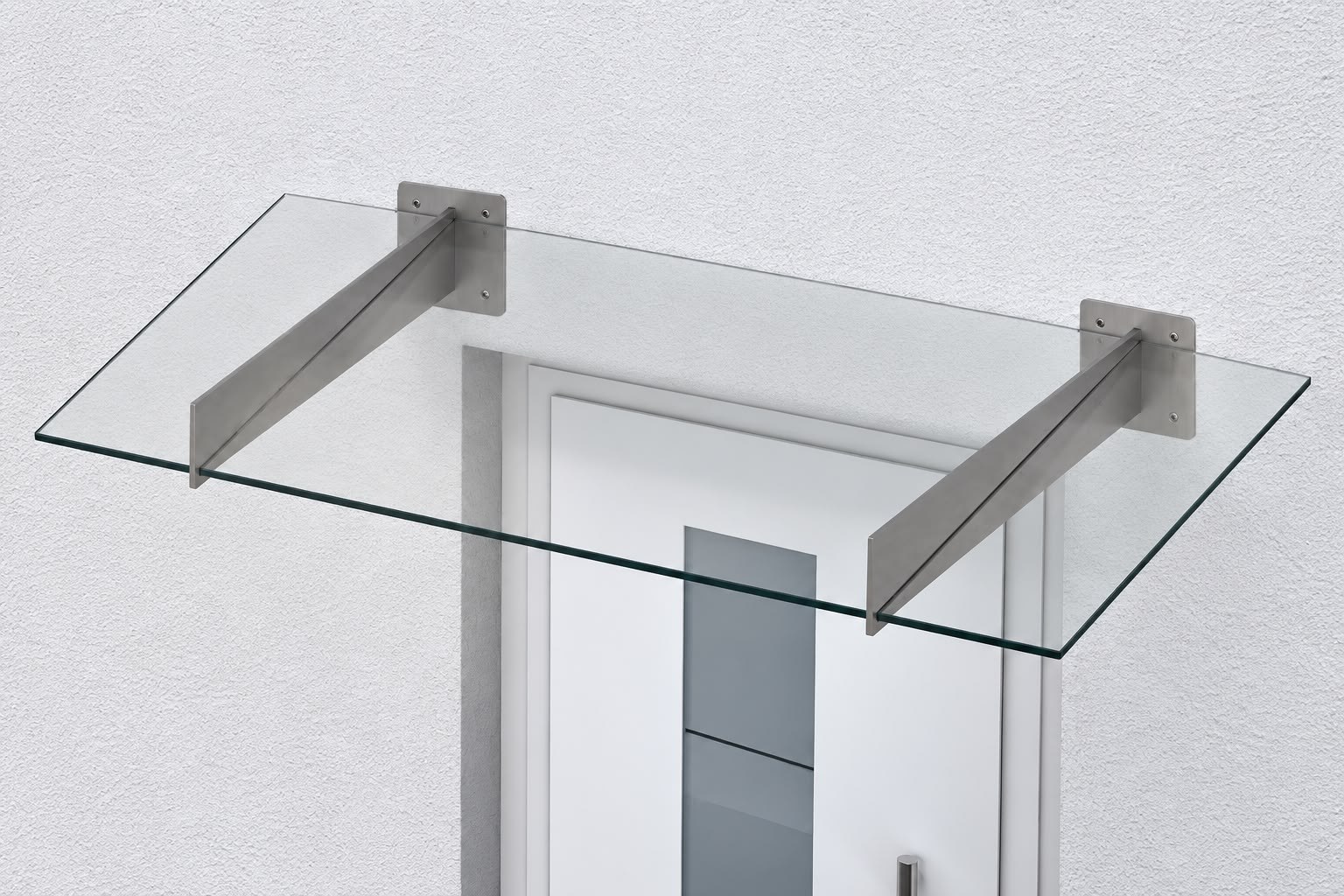 Glasvordach mit Wandkonsolen aus Edelstahl